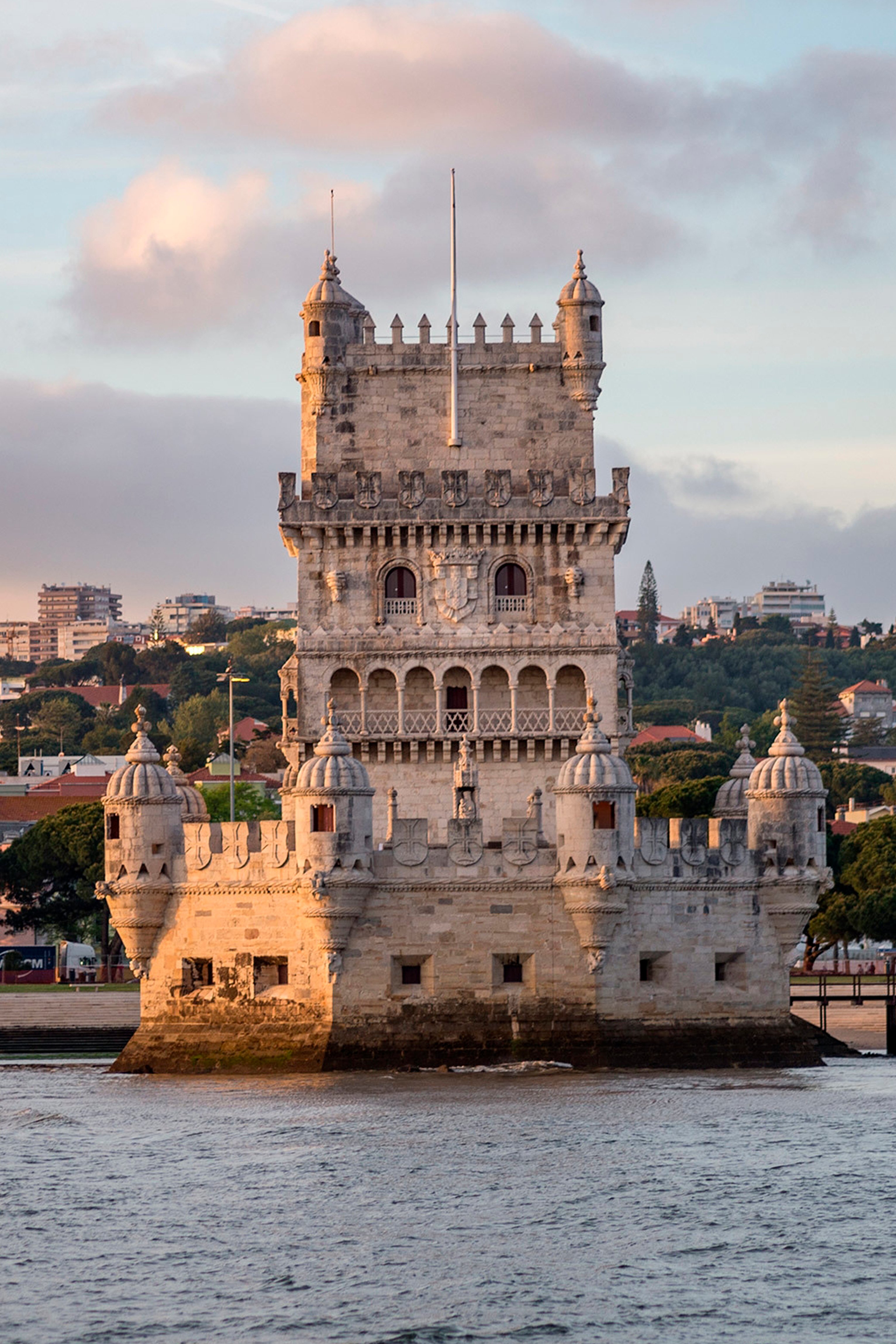 tower-belem-surrounded-by-sea-buildings-cloudy-sky-portugal copy